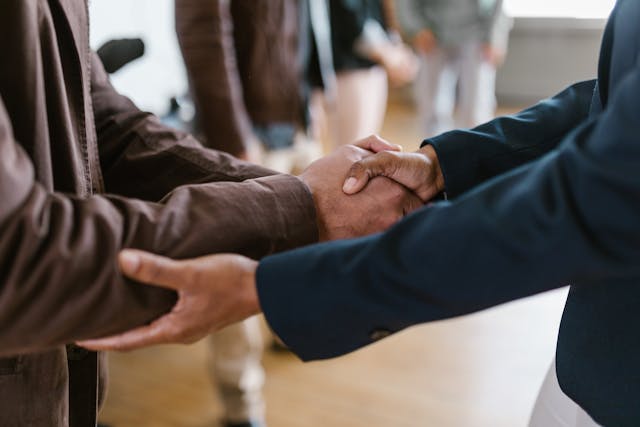 two people shaking hands