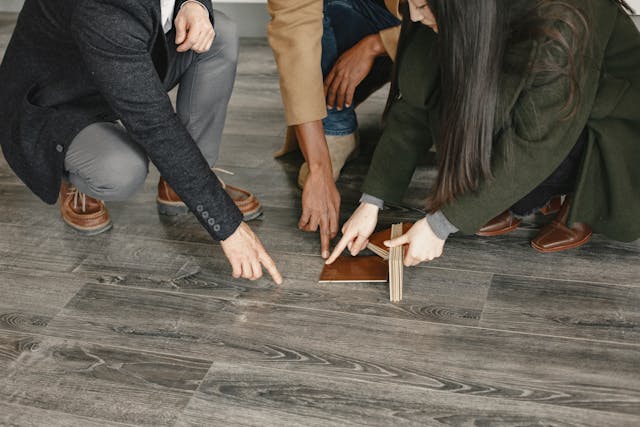 people comparing flooring colours