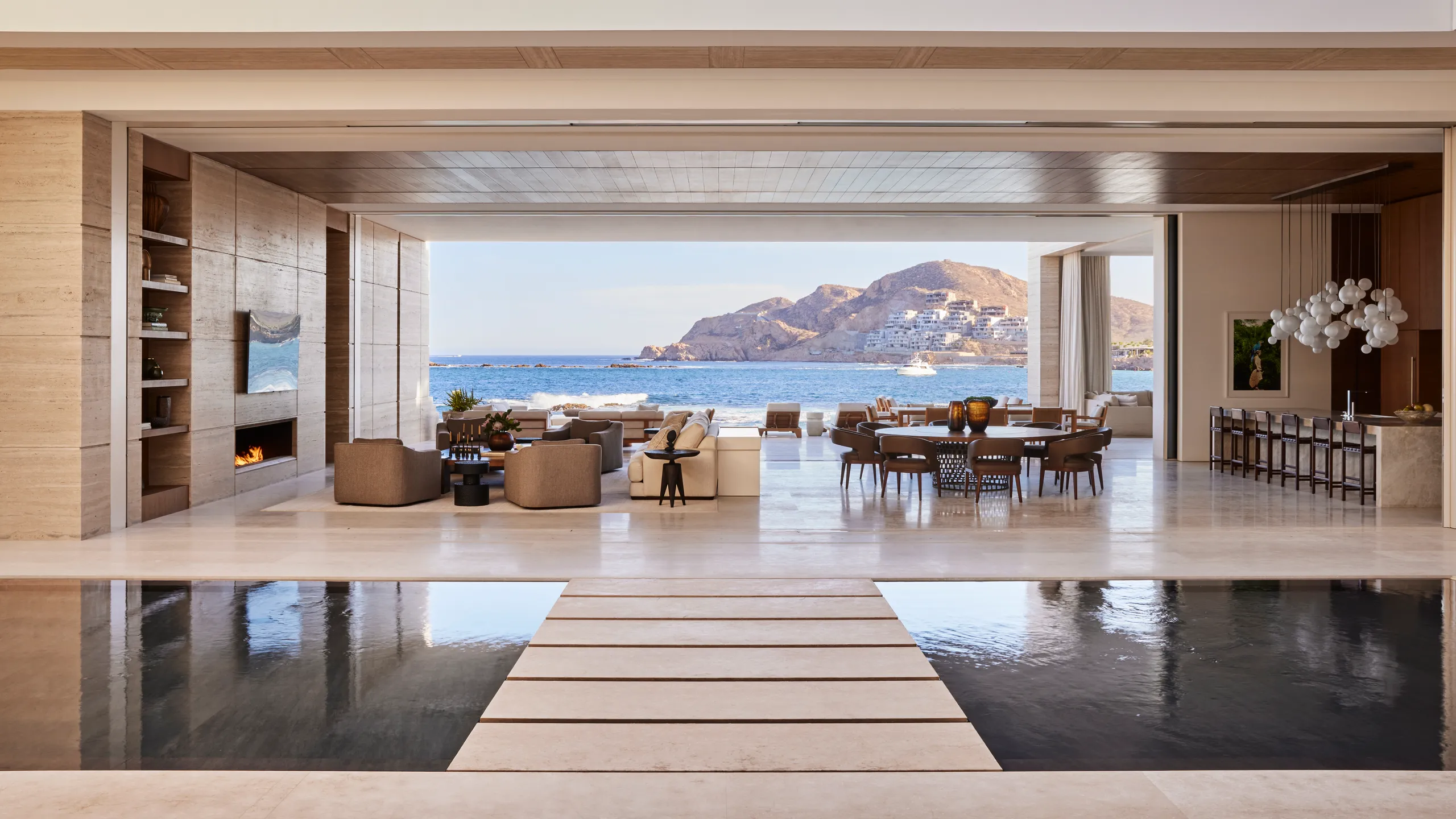 Luxury oceanfront living room with open design overlooking the sea in Los Cabos